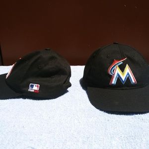 Two marlin baseball caps